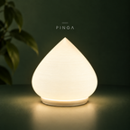 DROVA RGB table lamp on an ORBITA green background