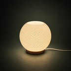 ELVIA Table Lamp — compact textured dimmable light by Orbita
