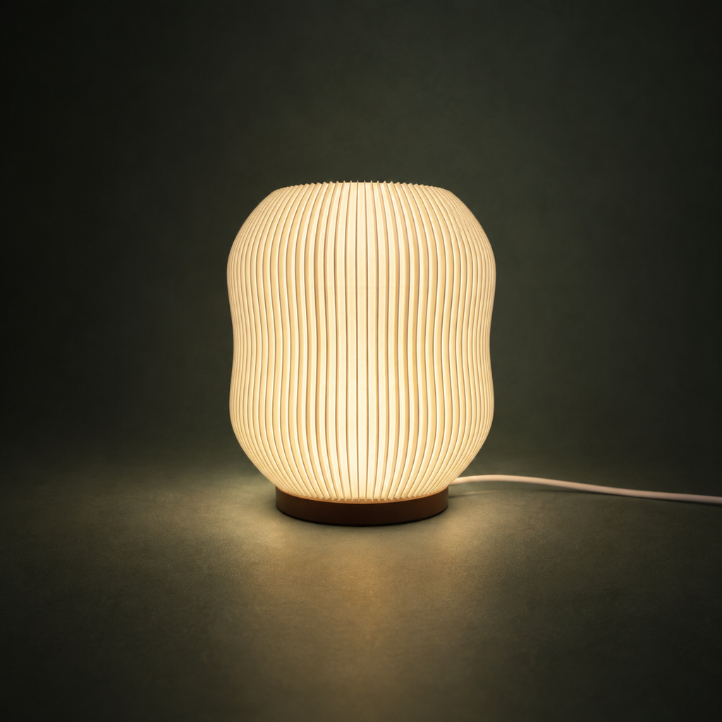 ASTRA Table Lamp — sculptural ribbed dimmable light by Orbita