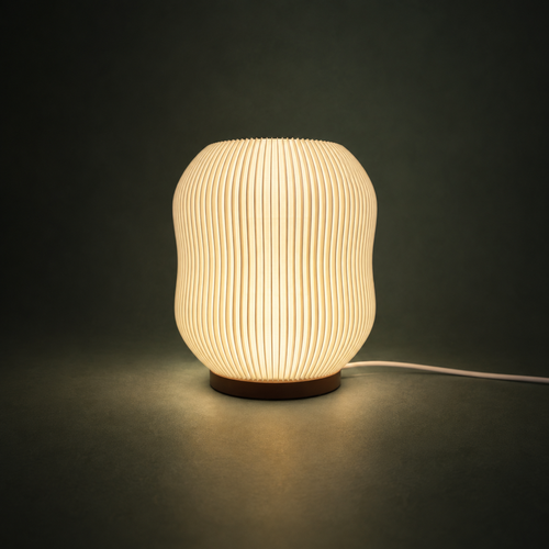 ASTRA Table Lamp — sculptural ribbed dimmable light by Orbita