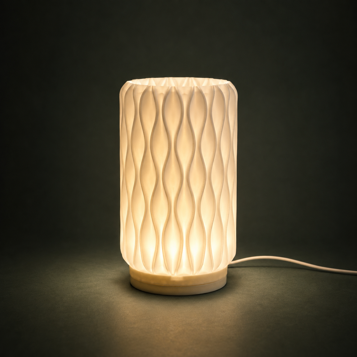 ONDA Table Lamp — compact sculptural dimmable light by Orbita