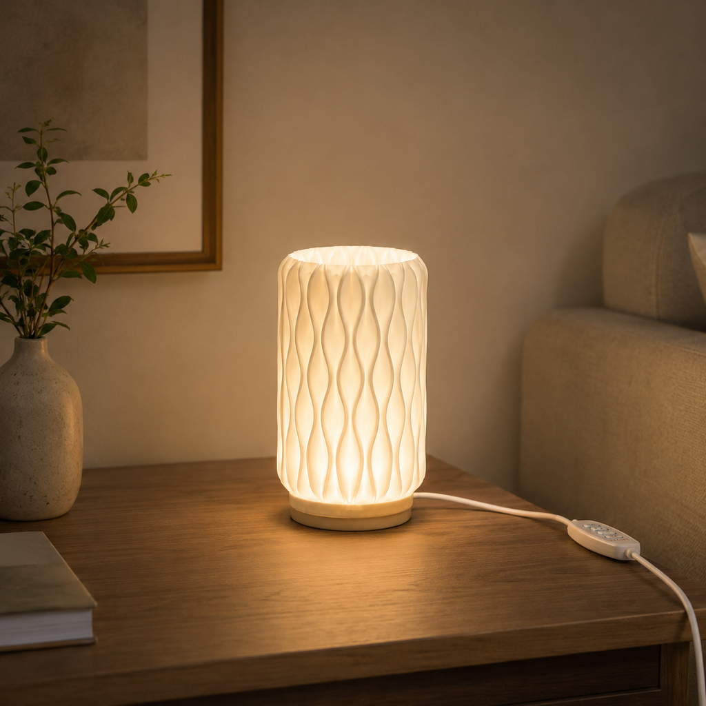 ONDA Table Lamp — compact sculptural dimmable light by Orbita