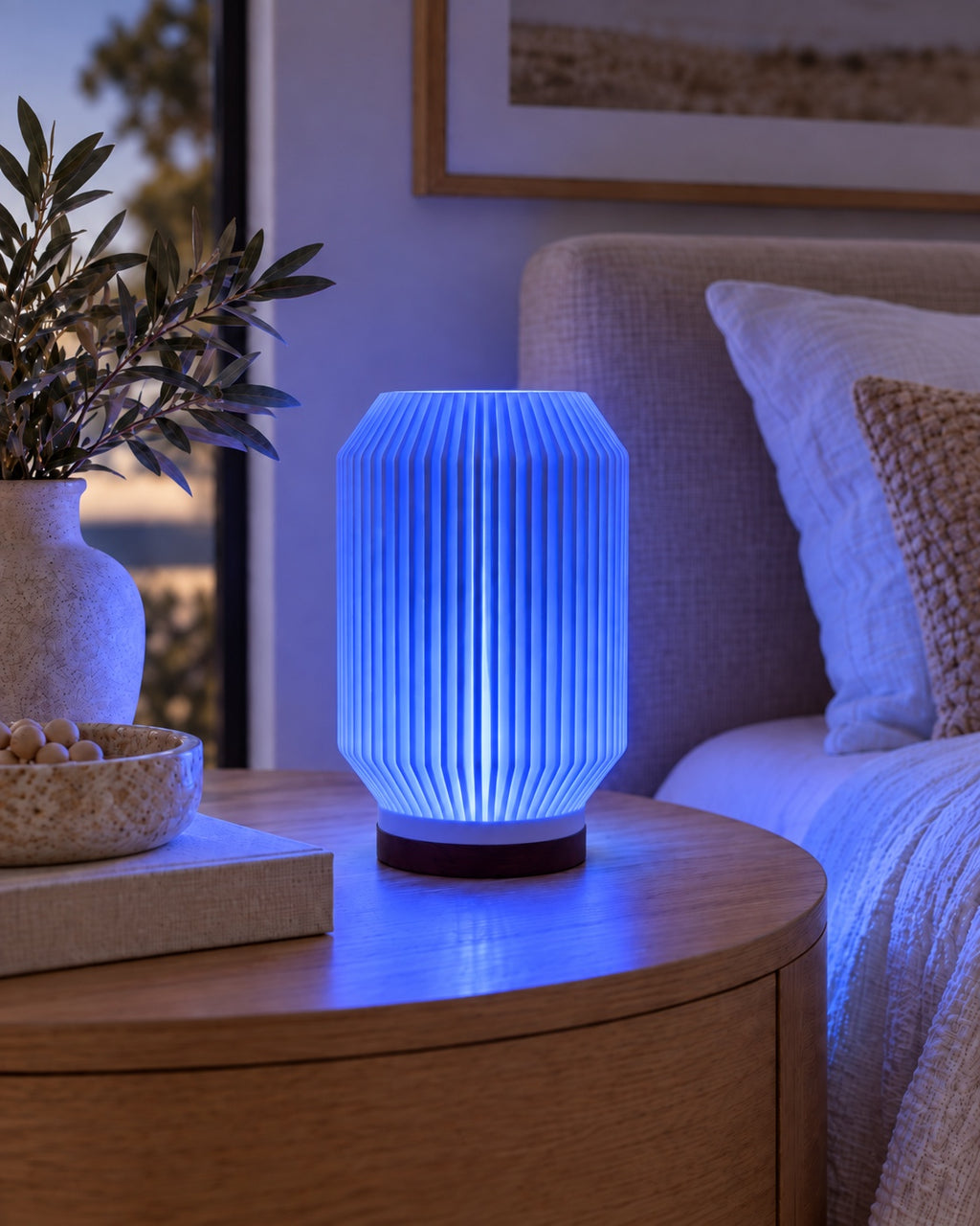 HALCYON RGB lamp glowing blue in a modern Australian bedroom
