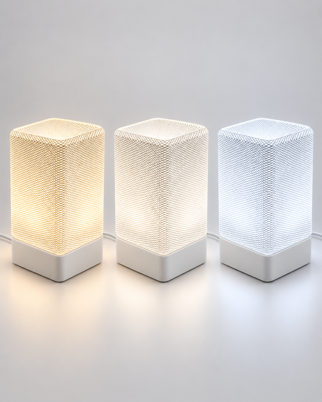 ARQO Table Lamp shown in warm neutral and cool white tones