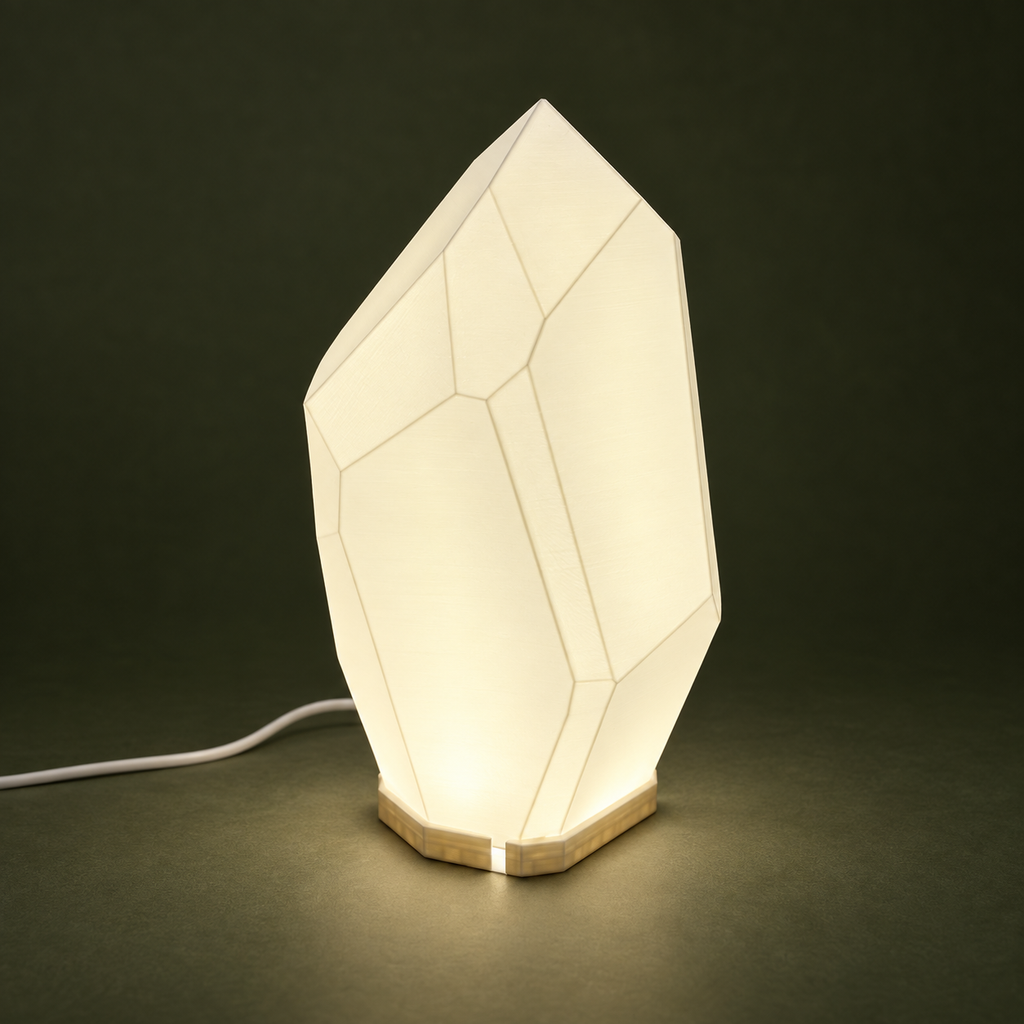 FACET faceted table lamp against a dark olive background