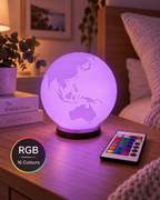 ORBIS RGB globe lamp glowing purple in a modern Australian bedroom with remote control and 16 colours badge